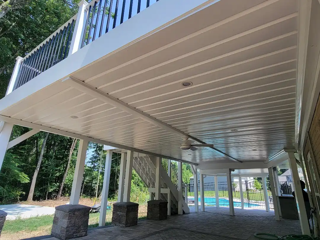 Custom underdeck ceiling system - water diversion