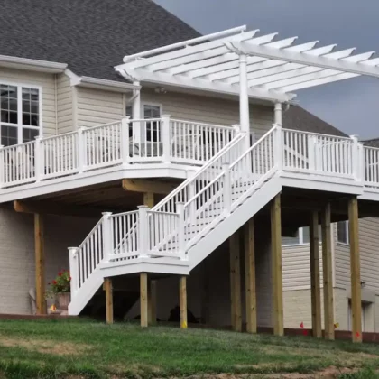 Photo of elevated deck with pergola and steps