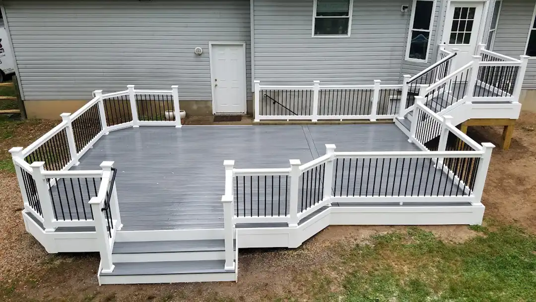 Photo of multi-level composite deck with steps and railing