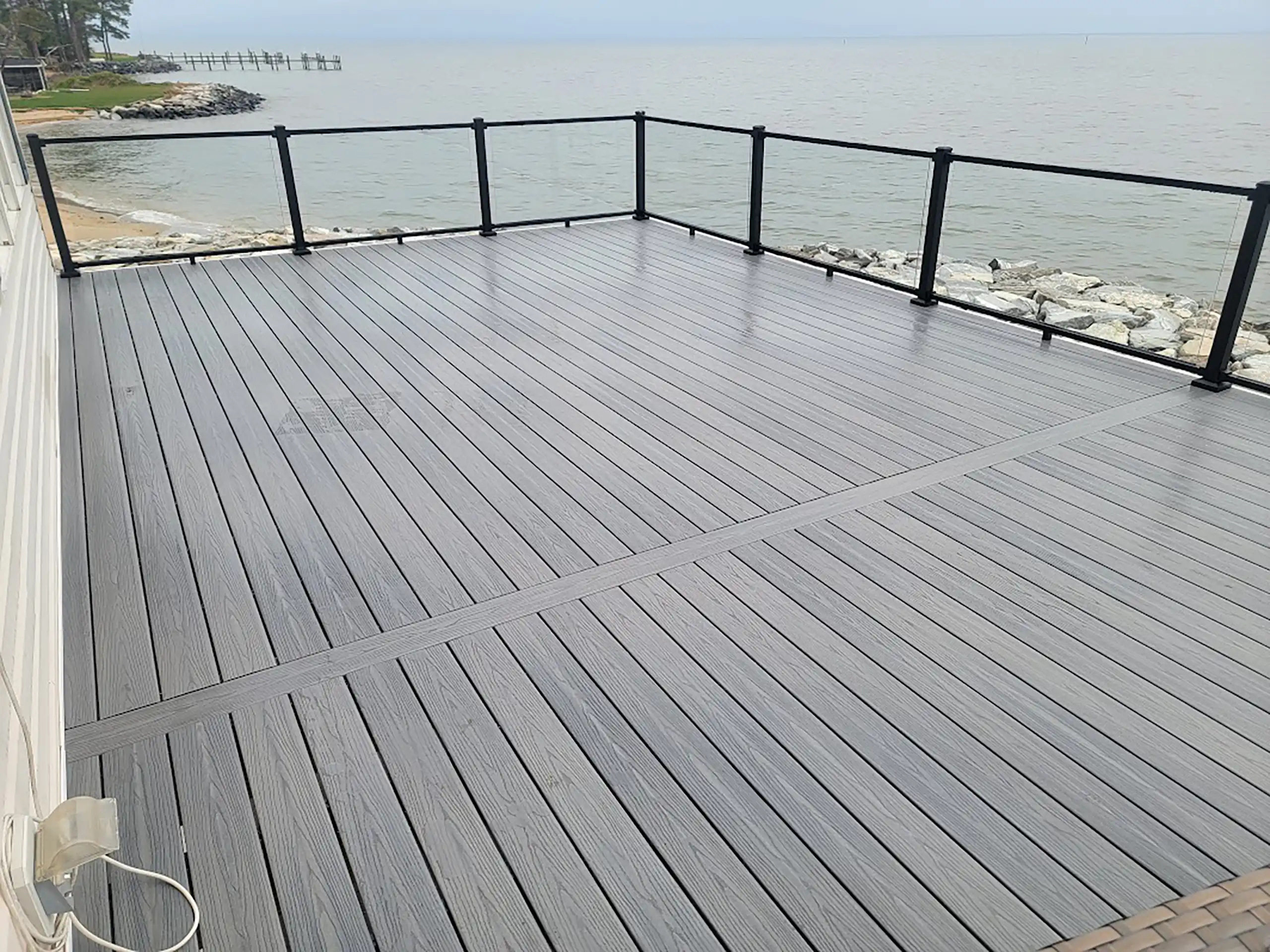 Photo of a composite deck along the waterfront - deck remodeling and deck resurfacing contractors in maryland