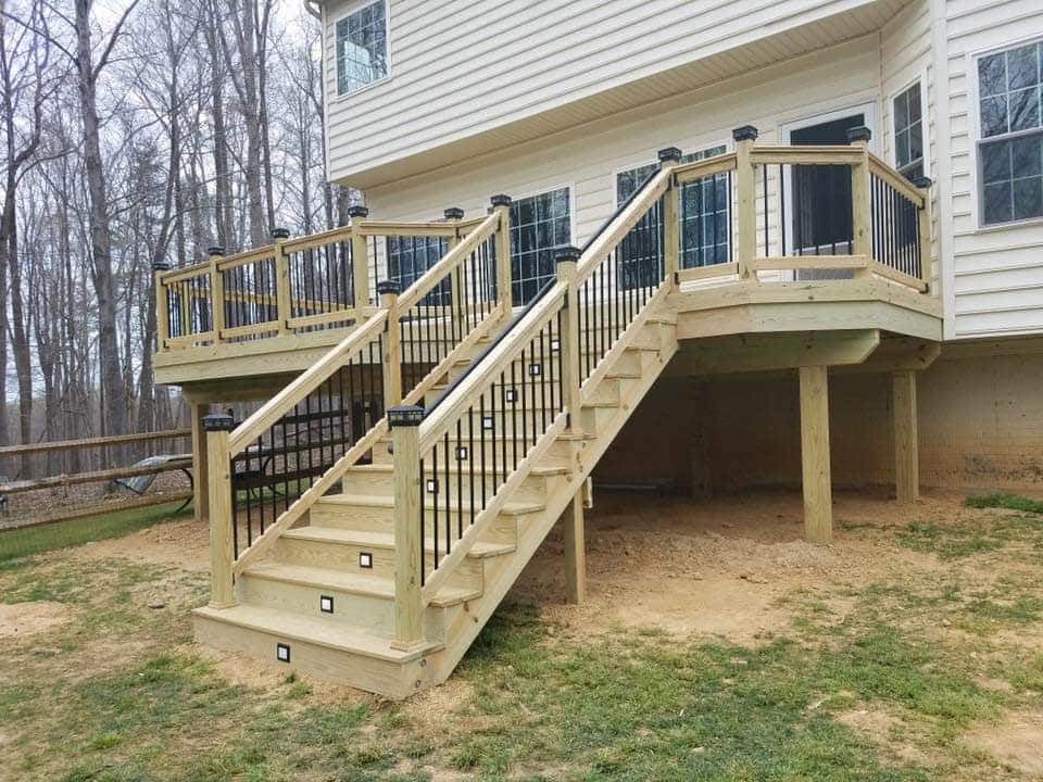 Wood deck with railing and in-step lighting - wood deck builders and contractor - maryland