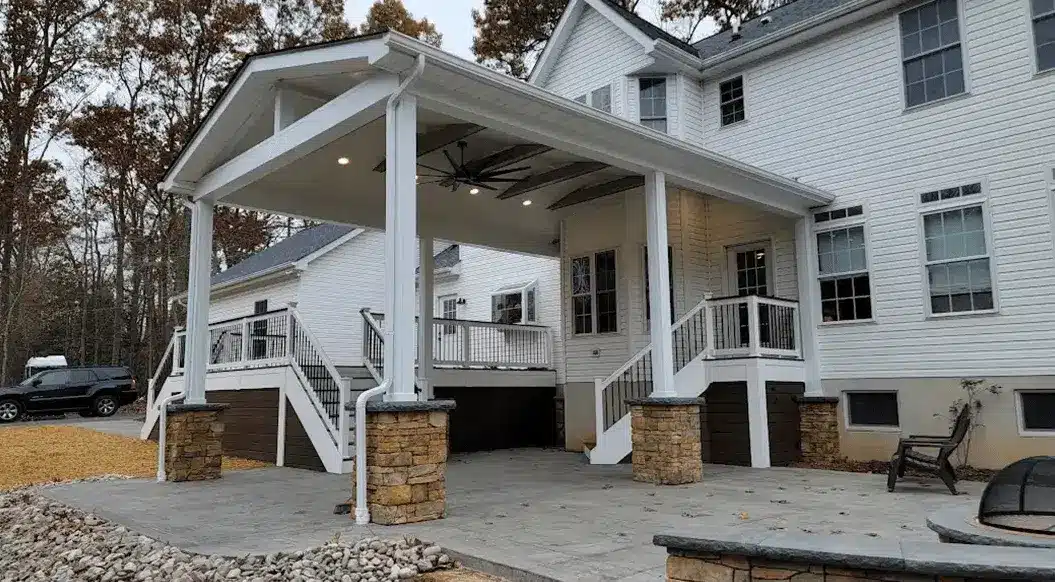 Photo of a covered deck with patio - different types of decks and their cost factors - deck contractors near me in southern maryland