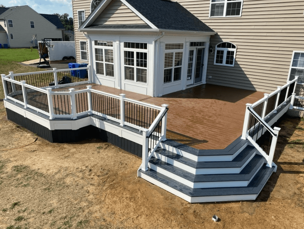 Photo of one of the trending composite deck ideas with bold colors and picture framing the deck - Color combination ideas for composite decks