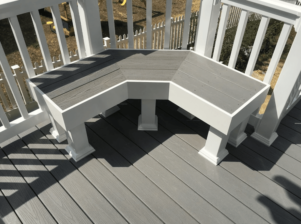 photo of a composite deck with a built-in bench - ideas of Built-In Features for composite decks