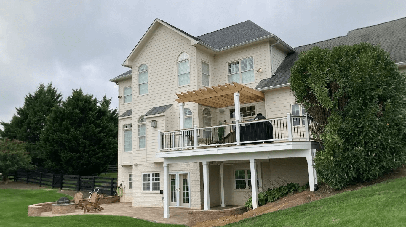 Elevated deck with a traditional pergola providing cover - Covered Decks Contractor near me in Southern Maryland